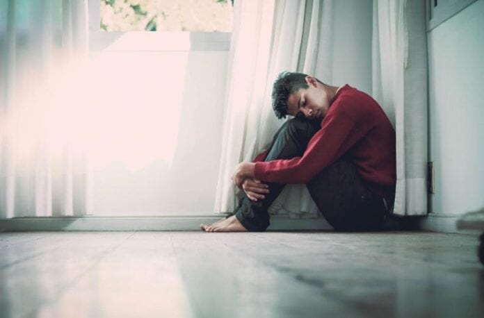young man on the floor