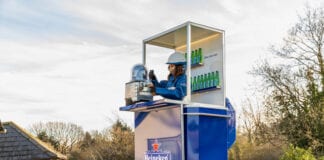 Sophie Ellis-Bextor tends bar in a cherry picker, delivering pints at heights through people’s windows