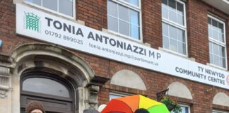 Greenpeace Swansea volunteers lobby Tonia Antoniazzi’s office to show Gower MP that constituents want green homes and fairer bills