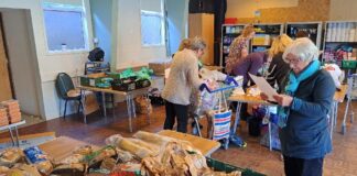A charity in Swansea that tackles poverty and hunger has received a £1,000 donation from the Amazon fulfilment centre in the city.